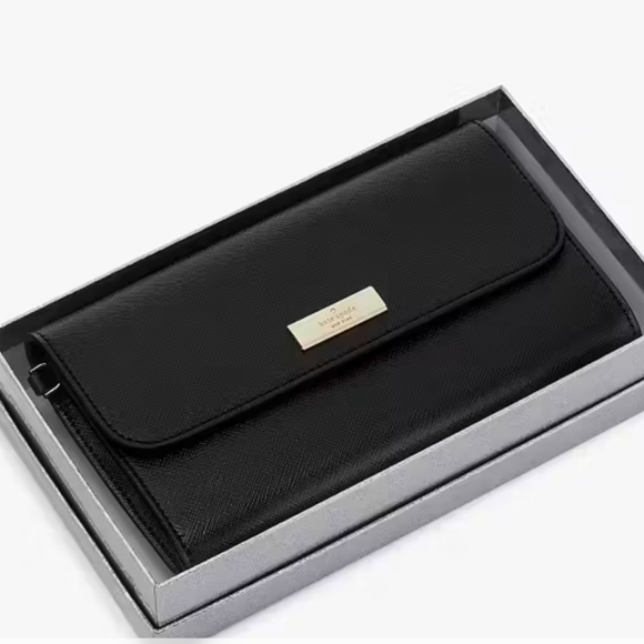 kate spade Handbags - Kate Spade Kenzie Boxed Medium Flap Wristlet New in Box